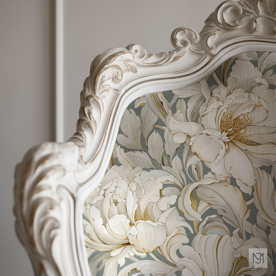 Ornate carved wood chair upholstered in the Golden Garden pattern fabric