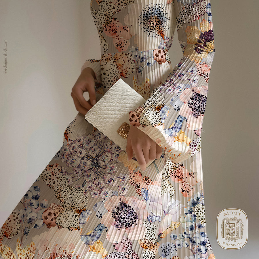 Pleated cream fabric skirt in the Wander Bloom pattern, with a woman holding a textured cream clutch bag