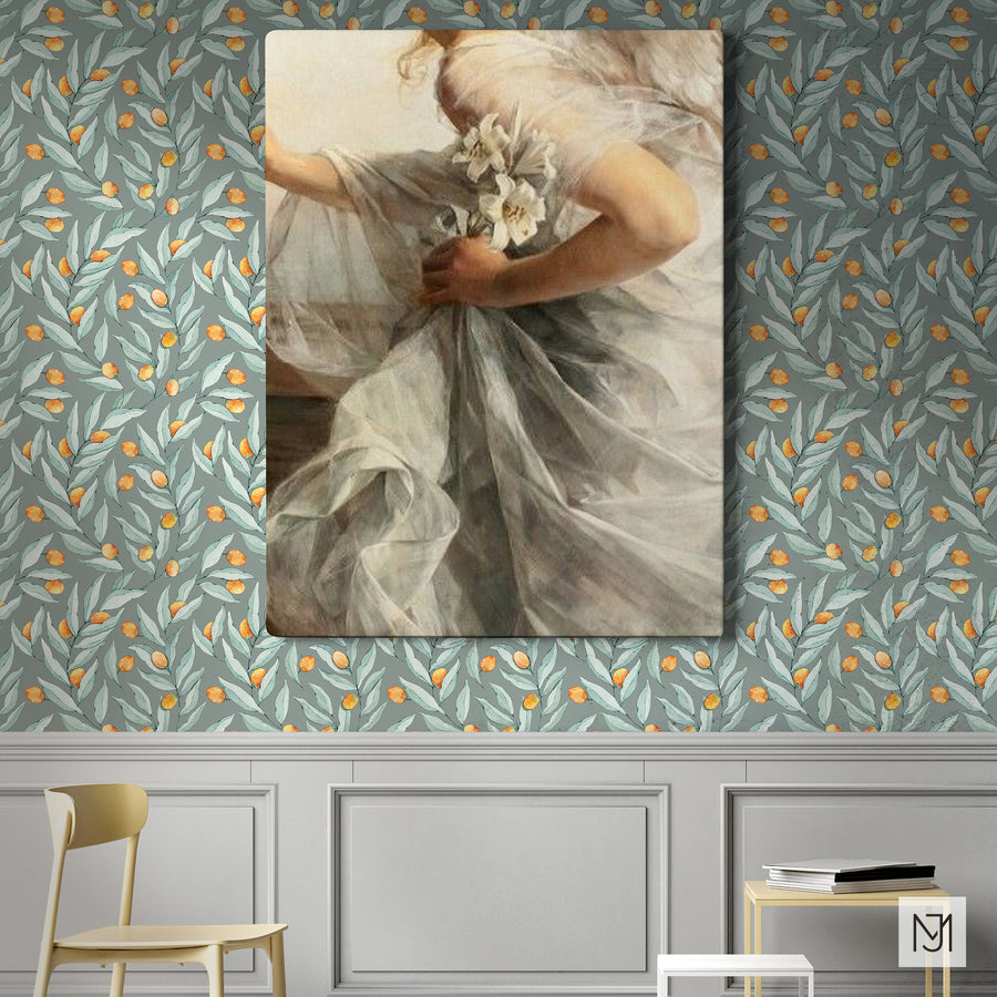 Citrus pattern as wallpaper in a sage gray-green colorway, behind a framed art print of a woman in a flowing dress holding white lilies.