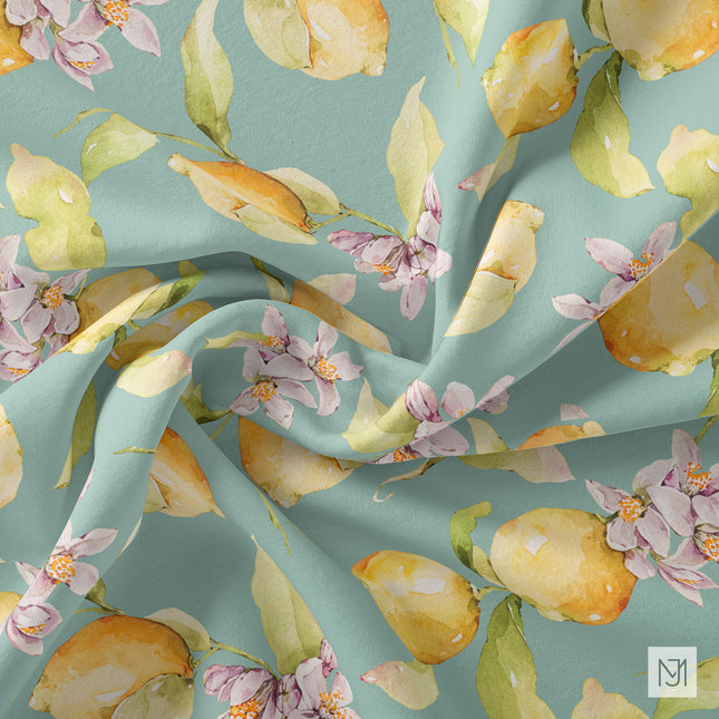 The Lemons pattern on rippled fabric, showing lemons and citrus blossoms across the folds.